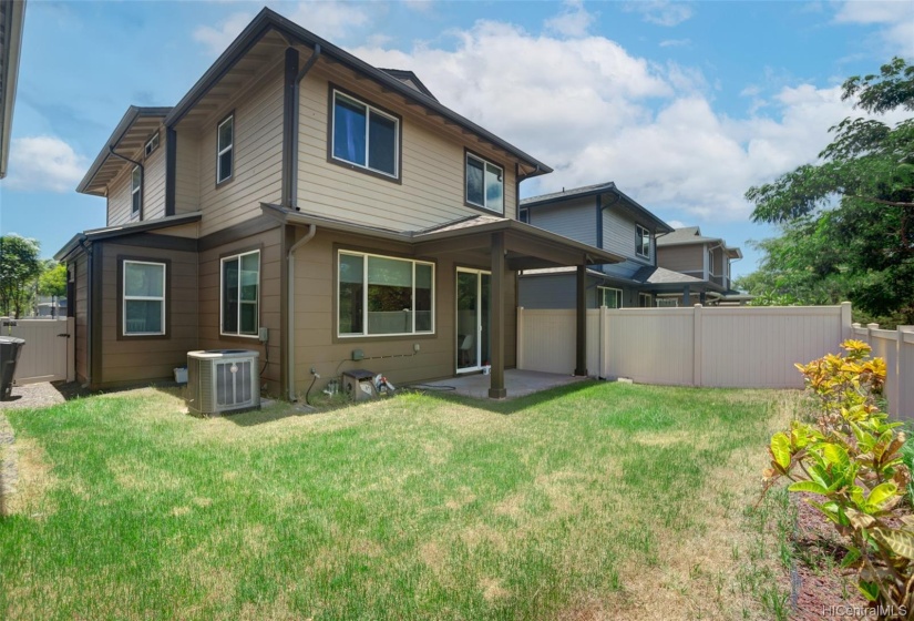 Sizeable yard with sprinkler system.