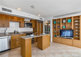 Sub-Zero refrigerator, Bosch dishwasher and microwave hood in the kitchen.