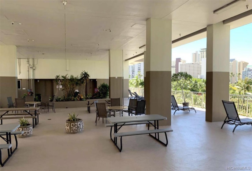 patio adjacent to the swimming pool