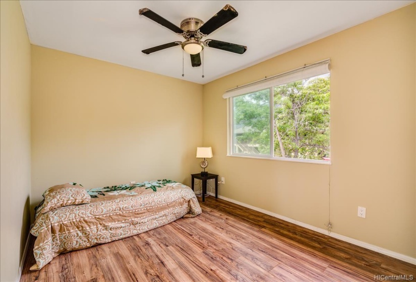 Smaller unit bedroom with mountain views