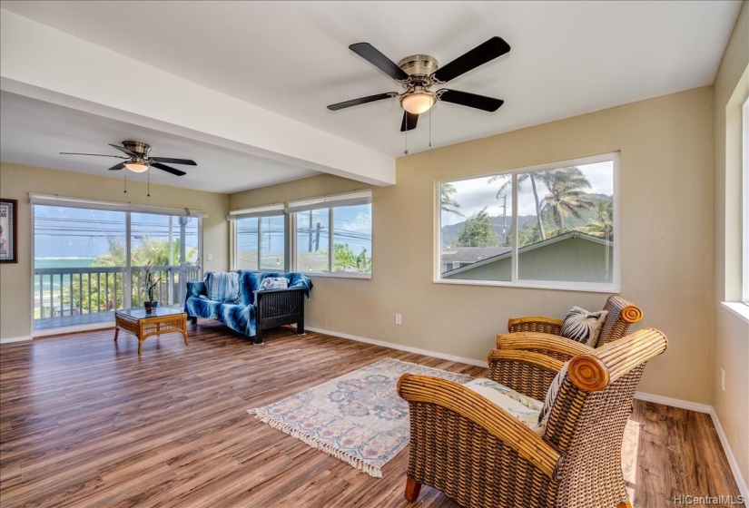 Spacious living area with ocean and mountain  views