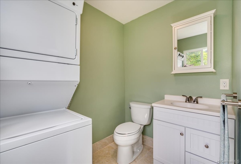 Half bath and laundry off the living area.