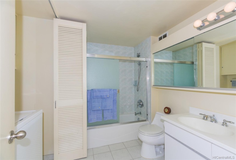 2nd bathroom also has a tub shower accommodates the laundry washer and dryer