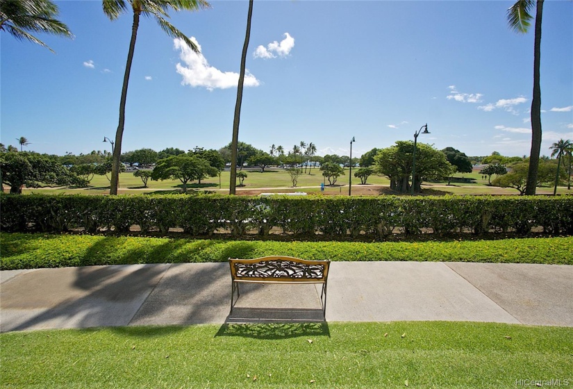 A sitting area overlooking Ala Moana Beach Park with added open vistas to the ocean.