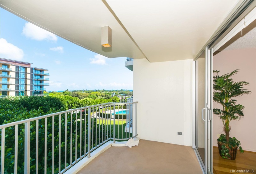 Brand new sliding glass doors and windows open upon a tablecloth of leaves with treetop views