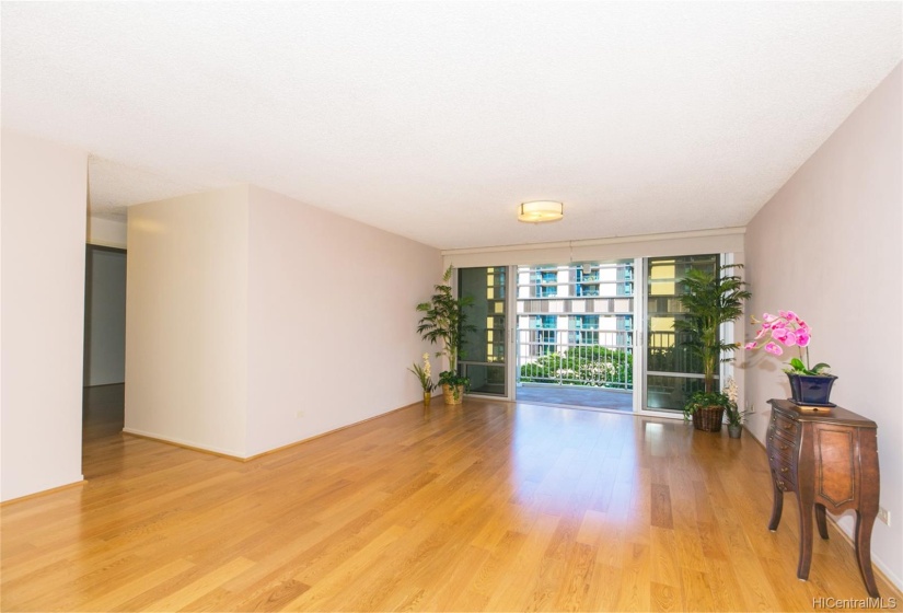 The kitchen opens onto the dining/living area. Love the new engineered oak hardwood floor.