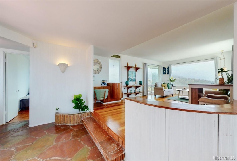 This art deco home features refinished teak wood floors and tons of classic built-in drawers/cabinets.