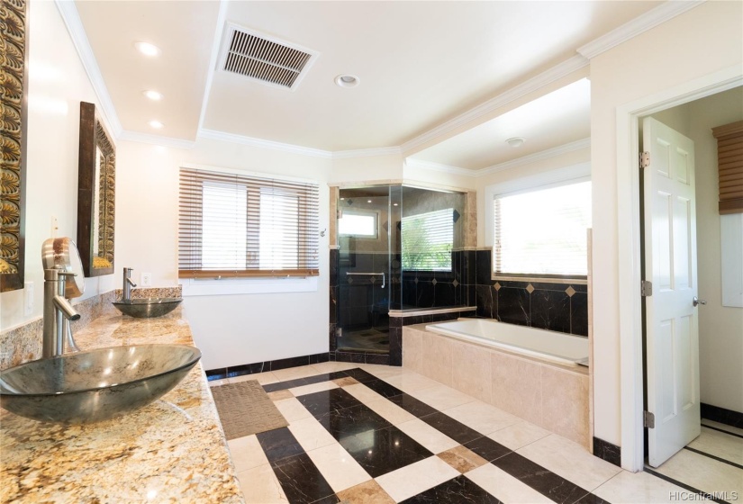 Master bathroom, with tub, double vanity.