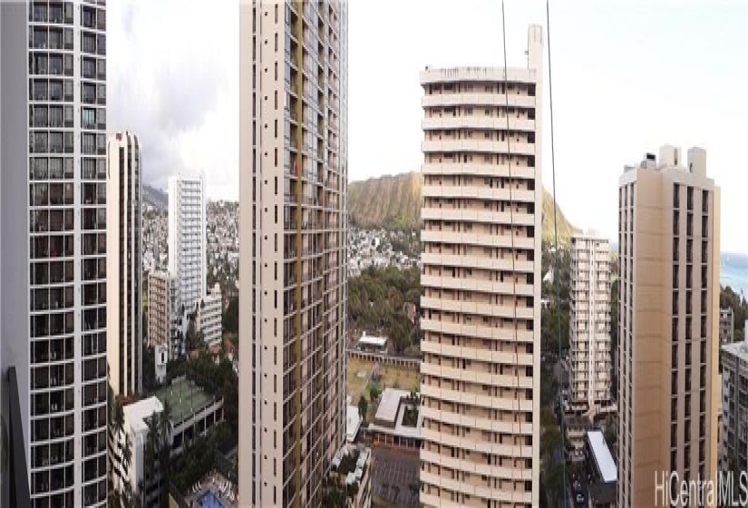 Panoramic view from lanai.  Diamondhead behind buildings.