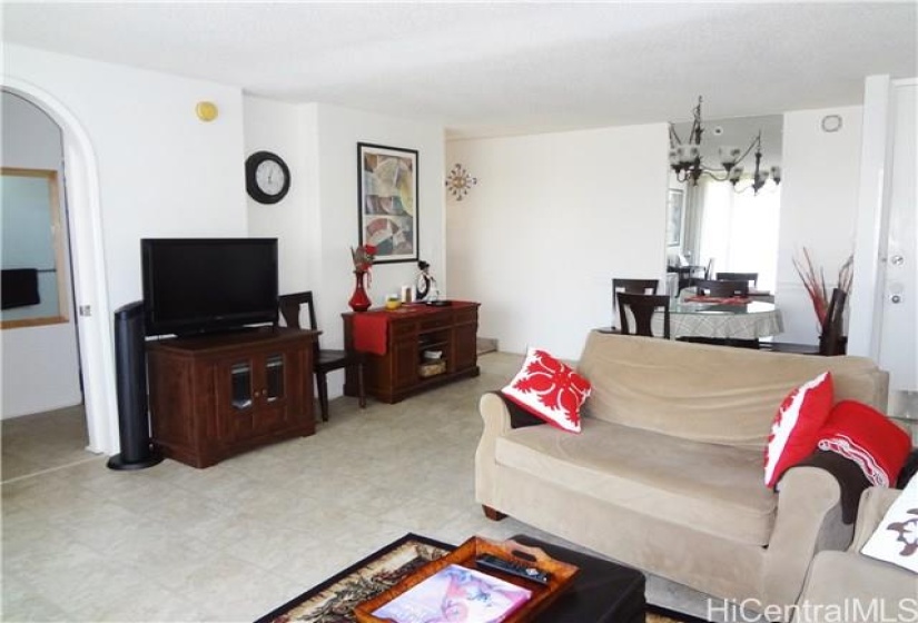 Kitchen by clock in middle.  Bedroom on left.