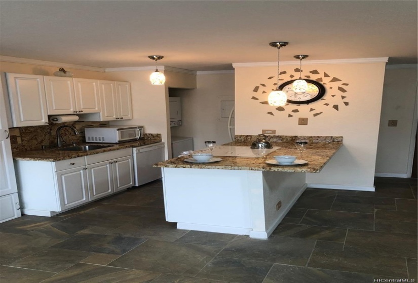 Kitchen as bar area for bar stools.