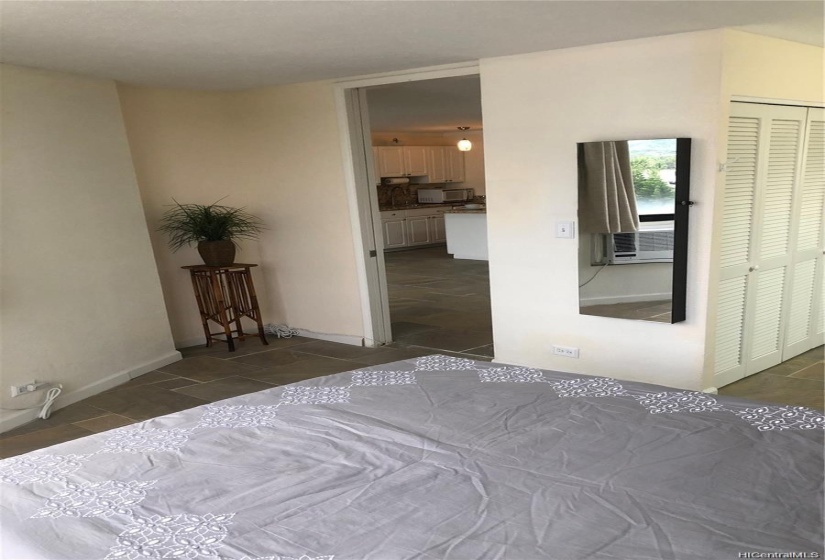 Master bedroom - view towards living room. Large spacious closet to the right.