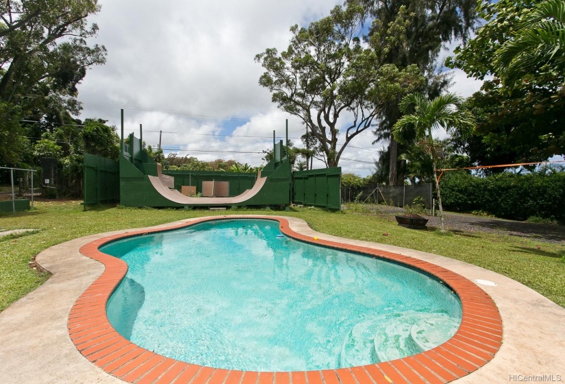 For those warm summer days, a cool. refreshing in-ground pool to jump into! Behind the pool is the skate ramp!