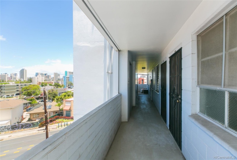 View of front door, front windows looking towards Kapahulu Ave