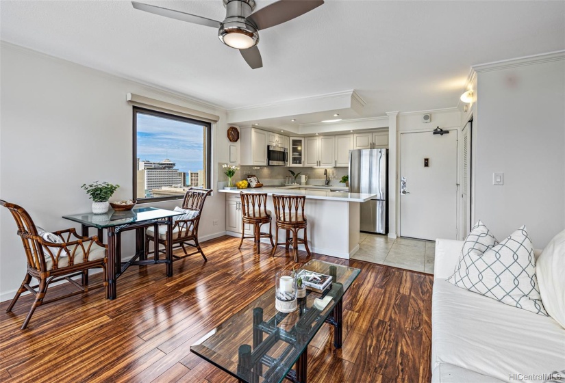 Reserve view of Living room, kitchen, and front entry