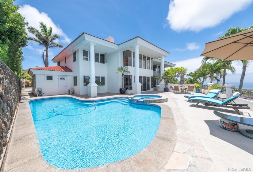 View of home, pool and outdoor deck and jacuzzi