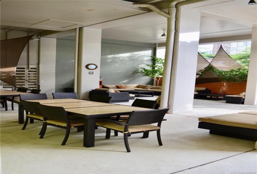 Seating and dining area near adjacent to the swimming pool