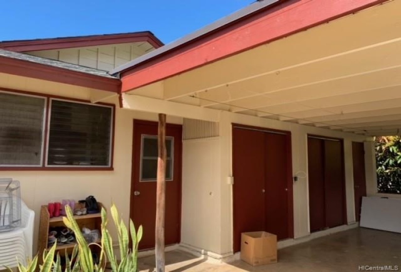 Garage doorway leading to laundry room and kitchen