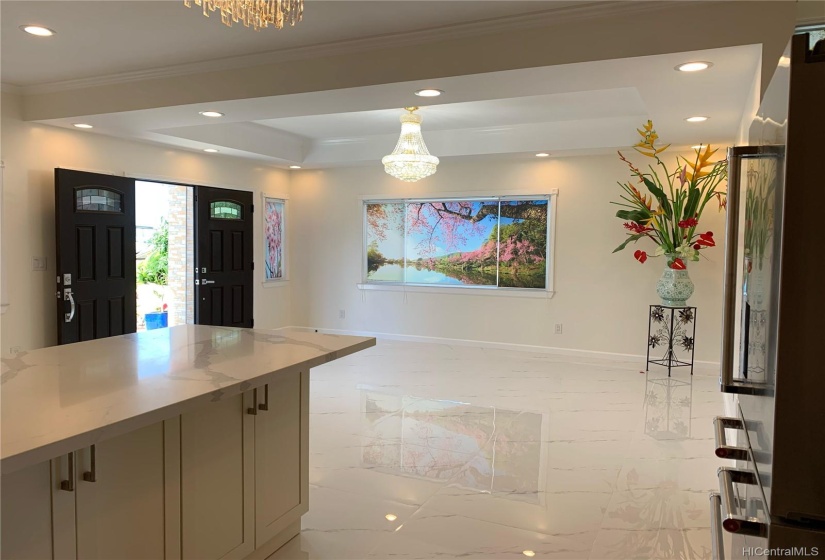 Main level living room with open kitchen