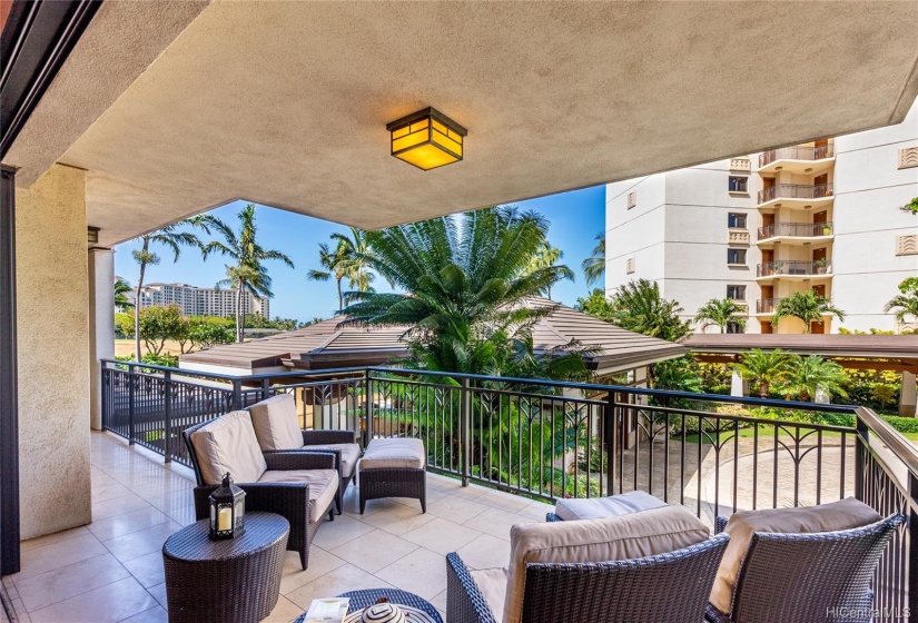 Spacious covered lanai with comfortable seating