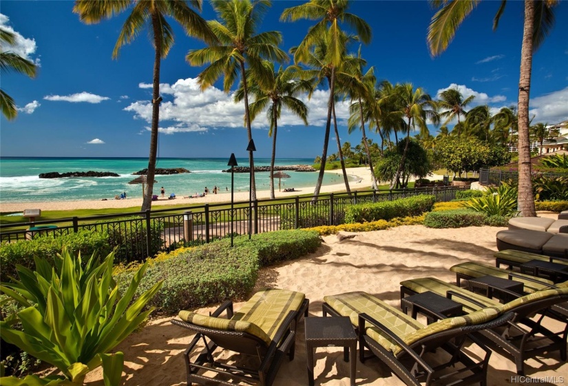 Beachfront lounge chairs adjacent the Beach Villas Beach Bar.