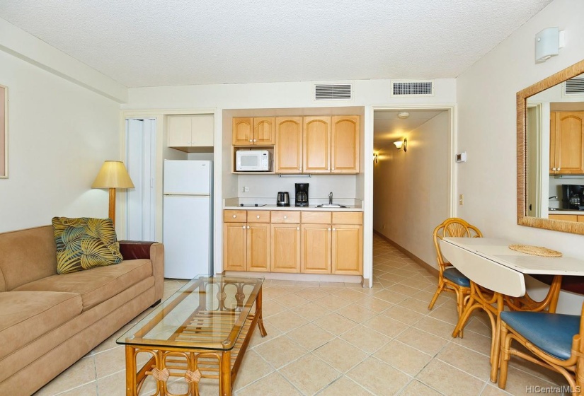 Hallway leads to bathroom and bedroom