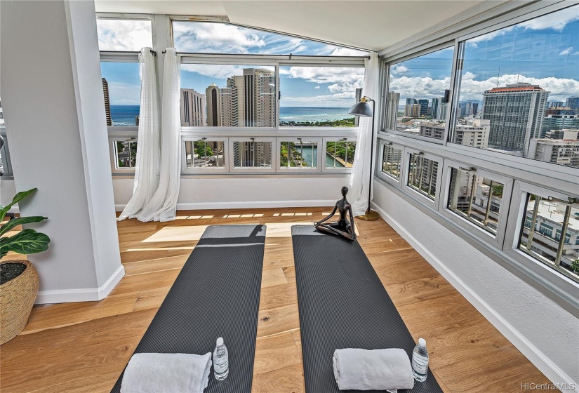 No need to go out for yoga or stretching.  This corner alcove is perfect as : library, an office, yoga, or a nice sitting area.