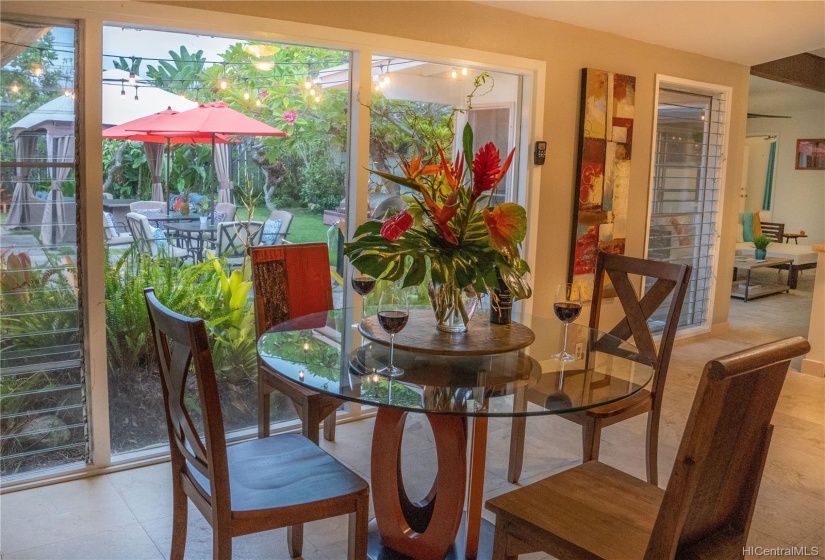 Breakfast nook with beautiful yard view.