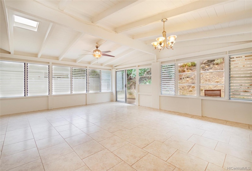 Spacious enclosed lanai area is perfect for entertaining.