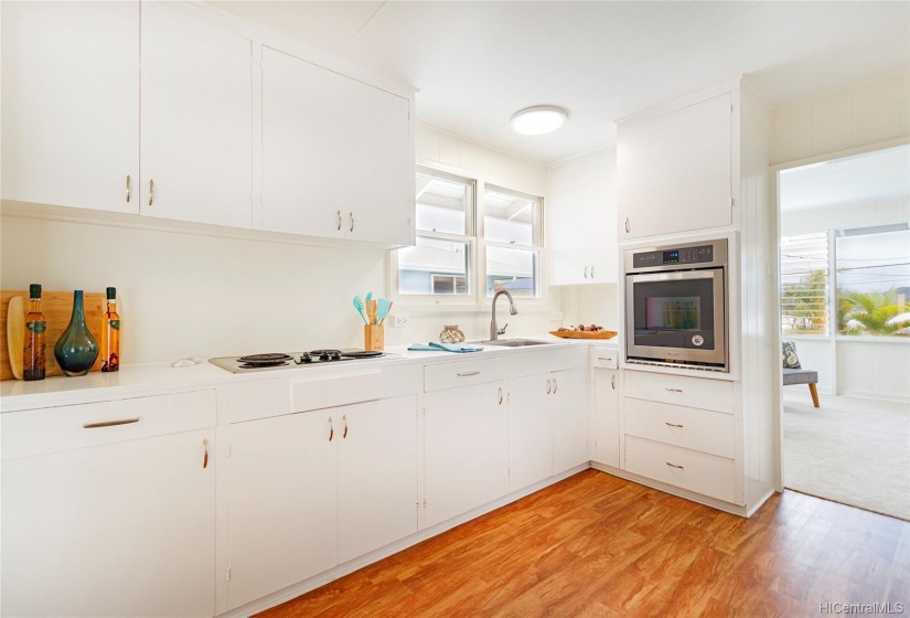 Kitchen with brand new stainless steel oven.