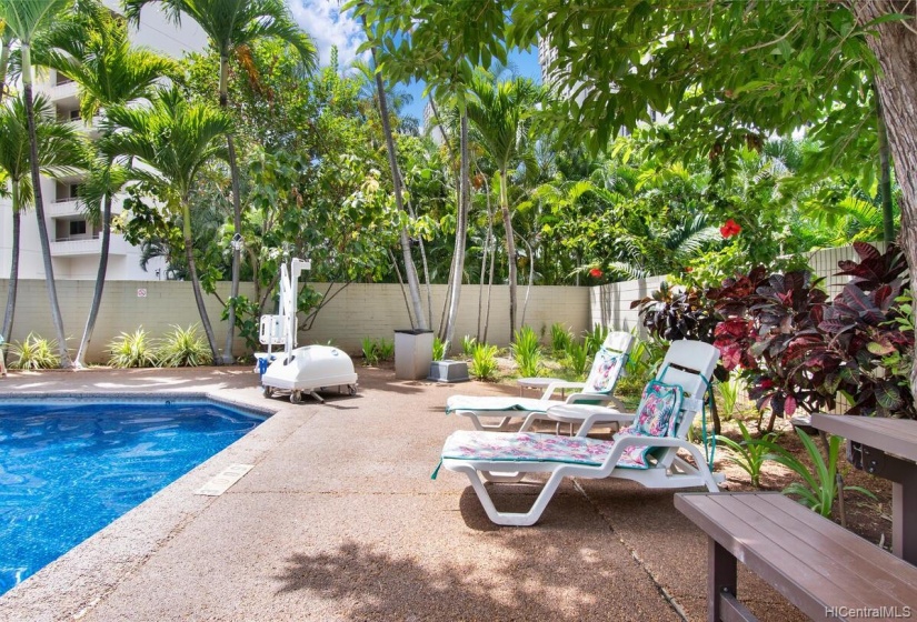 Lounging area next to pool.