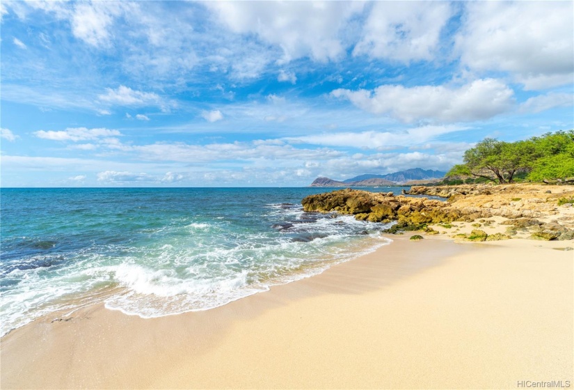 Sandy beach fronting the Kai Lani community