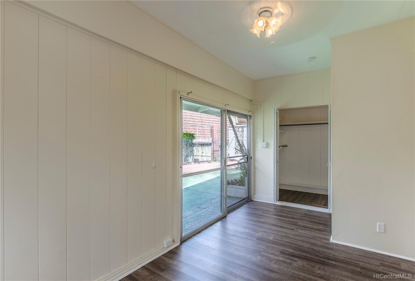 Attached 2/1 bedroom 2 with walk in closet and sliding doors to private courtyard