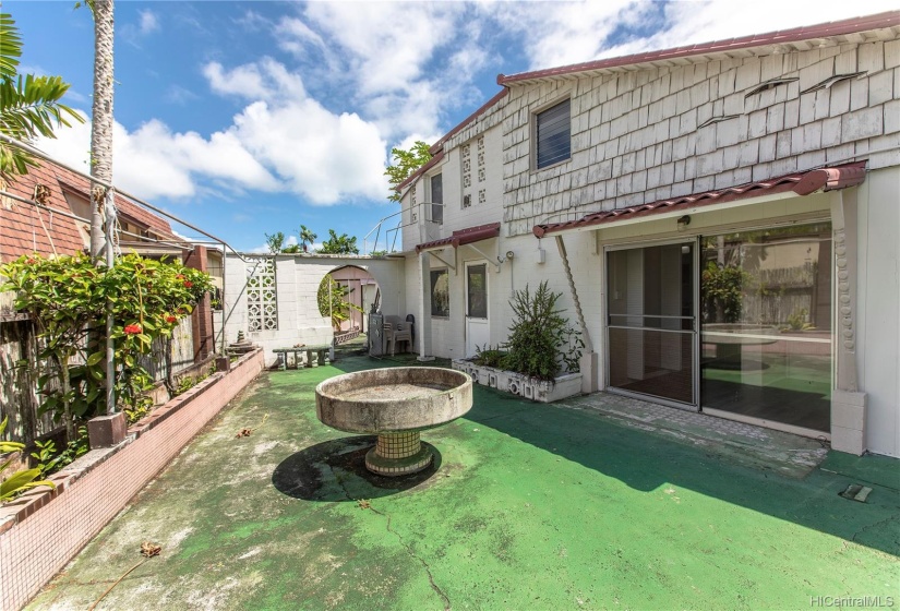 Private courtyard for 2/1. Large attic space above with external stairs