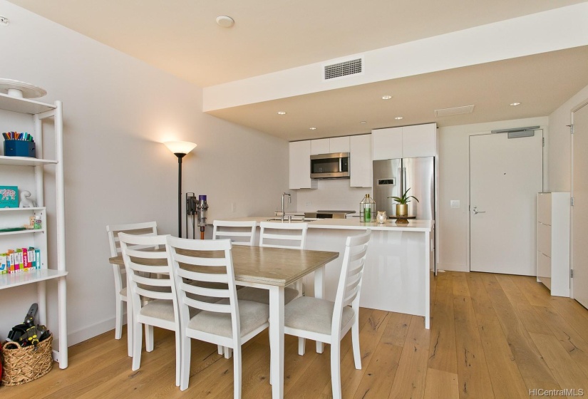 Living Room and Kitchen areas have Hardwood Flooring.