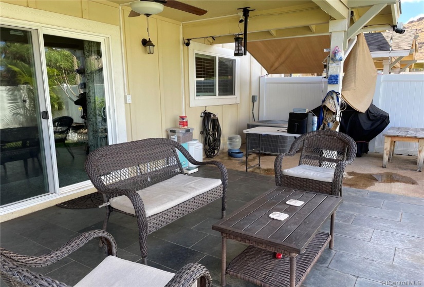 Tiled lanai sitting area and BBQ