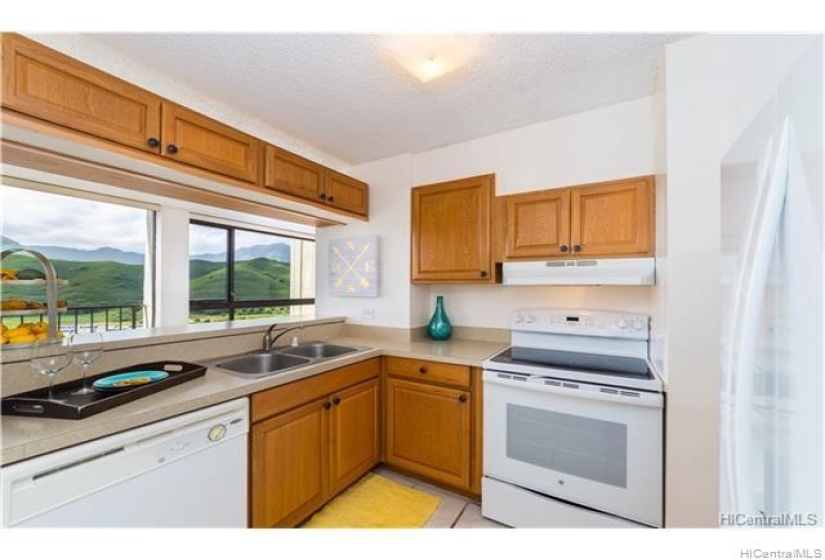 Kitchen equipped with dishwasher, range oven, and refrigerator. Please note: unit is currently Tenant occupied.