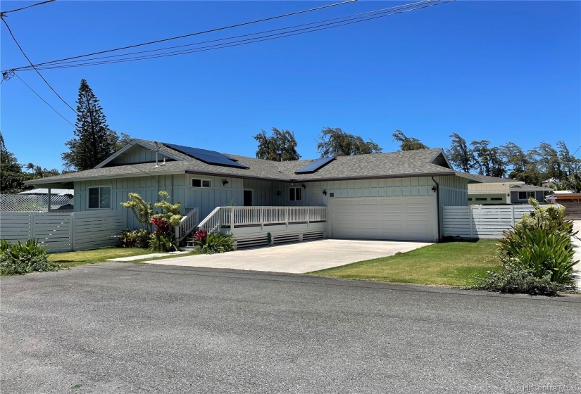 Located on end of street, one story plantation-style home