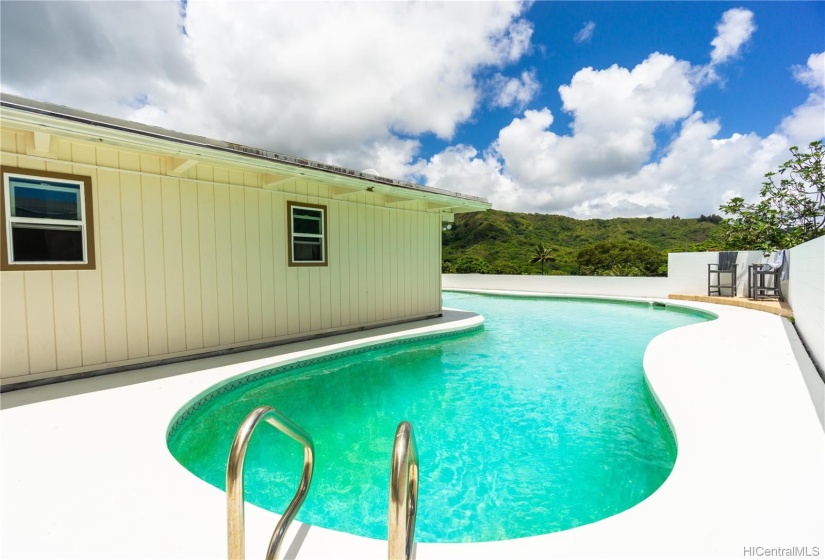 Pool wraps from side of house to back of house