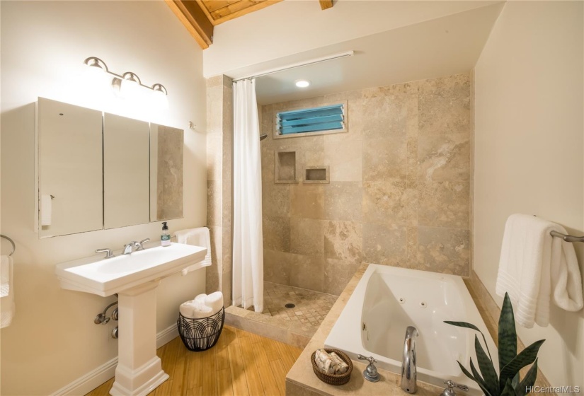 Bath with soaking tub in main house.