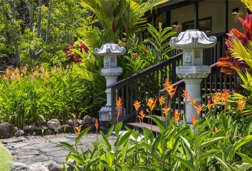 2 hand-carved pagodas from Japan grace the entrance.