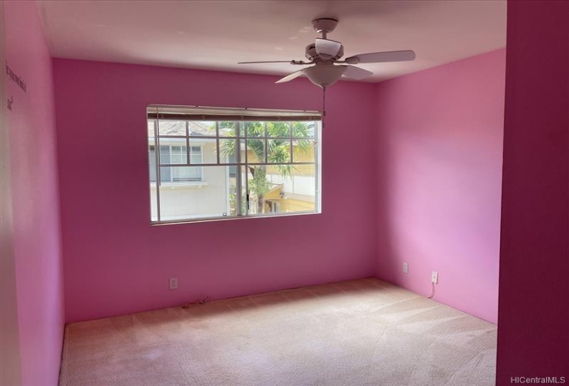 Third bedroom with ceiling fan.