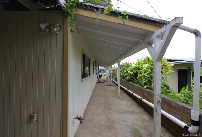 Downstairs has a large covered side patio