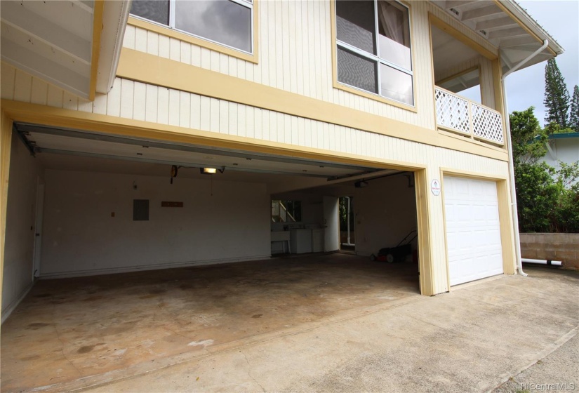 Three car garage with washer/dryer