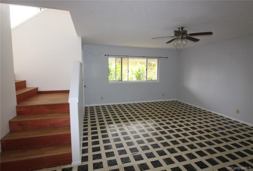 dining area & stairs that connect to upstairs living area.