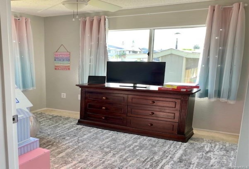 Corner bedroom offers lots of natural light