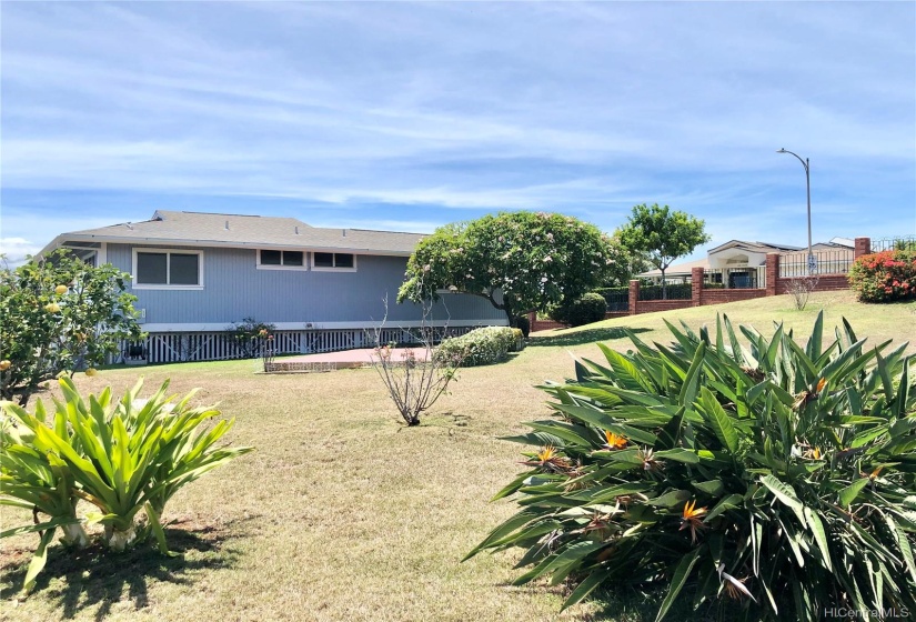 Beautiful corner lot, lots of room to expand! Back of house view.