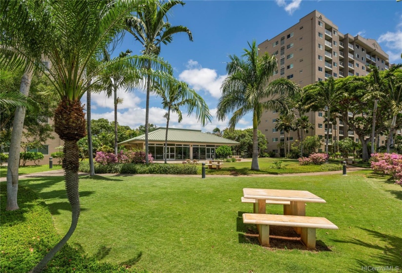 Lovely landscaped grounds around recreation/meeting room, BBQ area. Dog run is behind recreation building.