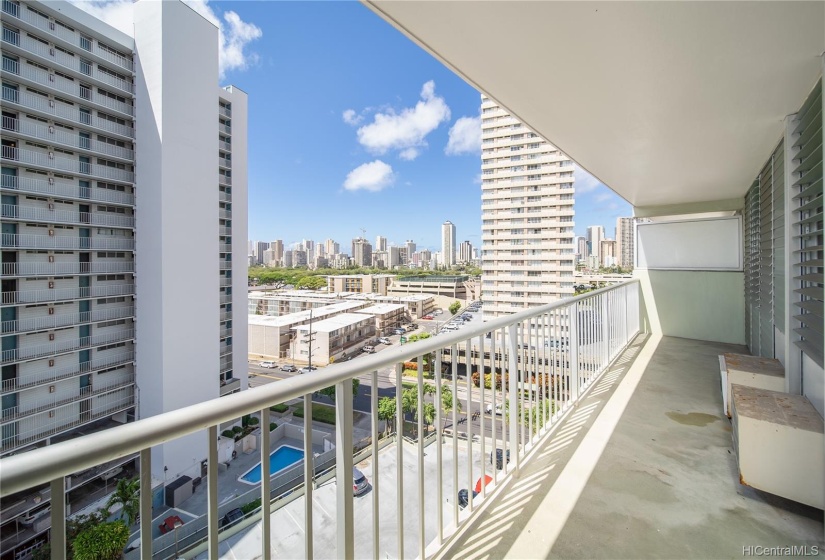 Enjoy the view of the city skyline on your large 140 sqft lanai