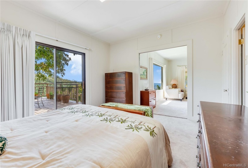 Nice size bedroom opens to the scenic deck.